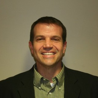 Moore-headshot-375x322.jpeg